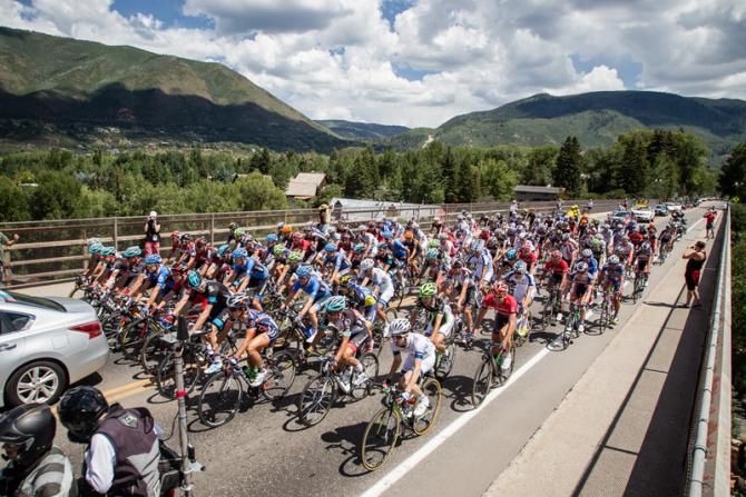 The peloton rolls out of downtown for the official race start.