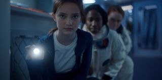 Maya McNair, Sophia Walker and Alex Paxton-Beesley in episode 7 of "Circuit Breakers," premiering Friday, Nov. 11, 2022 on Apple TV+.