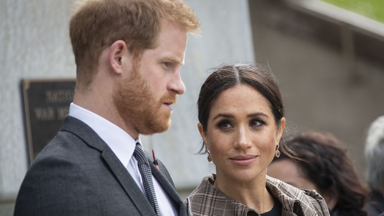 wellington, nz october 28 prince harry, duke of sussex and meghan, duchess of sussex lay ferns and a wreath at the tomb of the unknown warrior at the newly unveiled uk war memorial and pukeahu national war memorial park, on october 28, 2018, in wellington, new zealand the duke and duchess of sussex are on their official 16 day autumn tour visiting cities in australia, fiji, tonga and new zealand photo by rosa woods poolgetty images