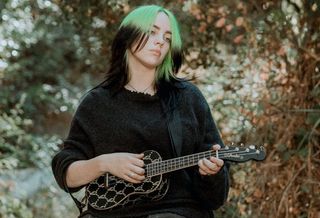 Billie Eilish plays her signature Fender ukulele