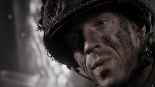 A closeup of Damian Lewis in his fatigues in Band of Brothers.