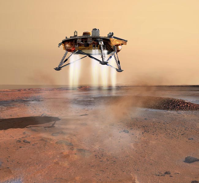 MARS MISSION UPDATE: Phoenix Mars Lander Makes &#039;Footprint&#039; With Robotic Arm