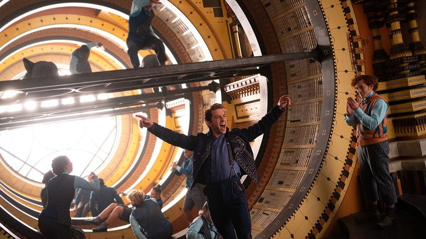 Jonathan Bailey as Fiero sings in the middle of a big clock in the library.