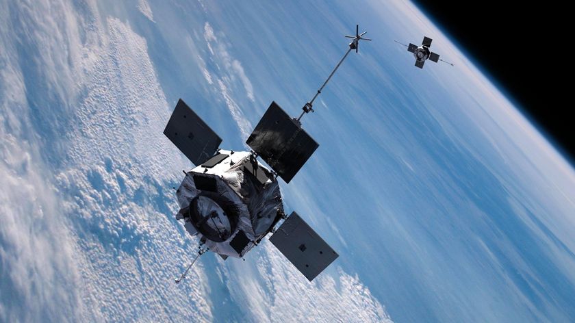 The twin Van Allen Probes orbit in Earth's inner and outer radiation belts.