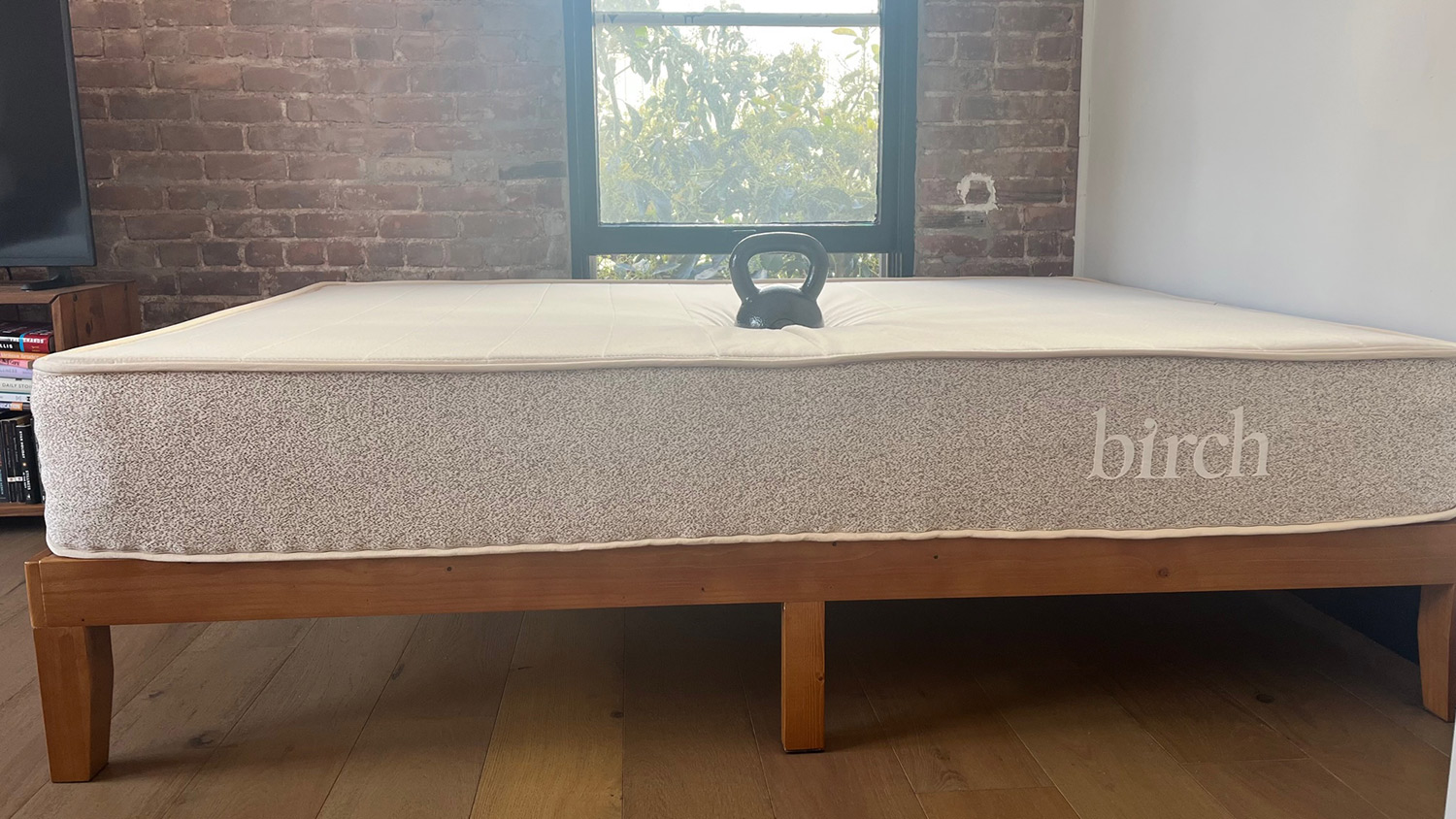 A kettlebell on the Birch Natural Mattress