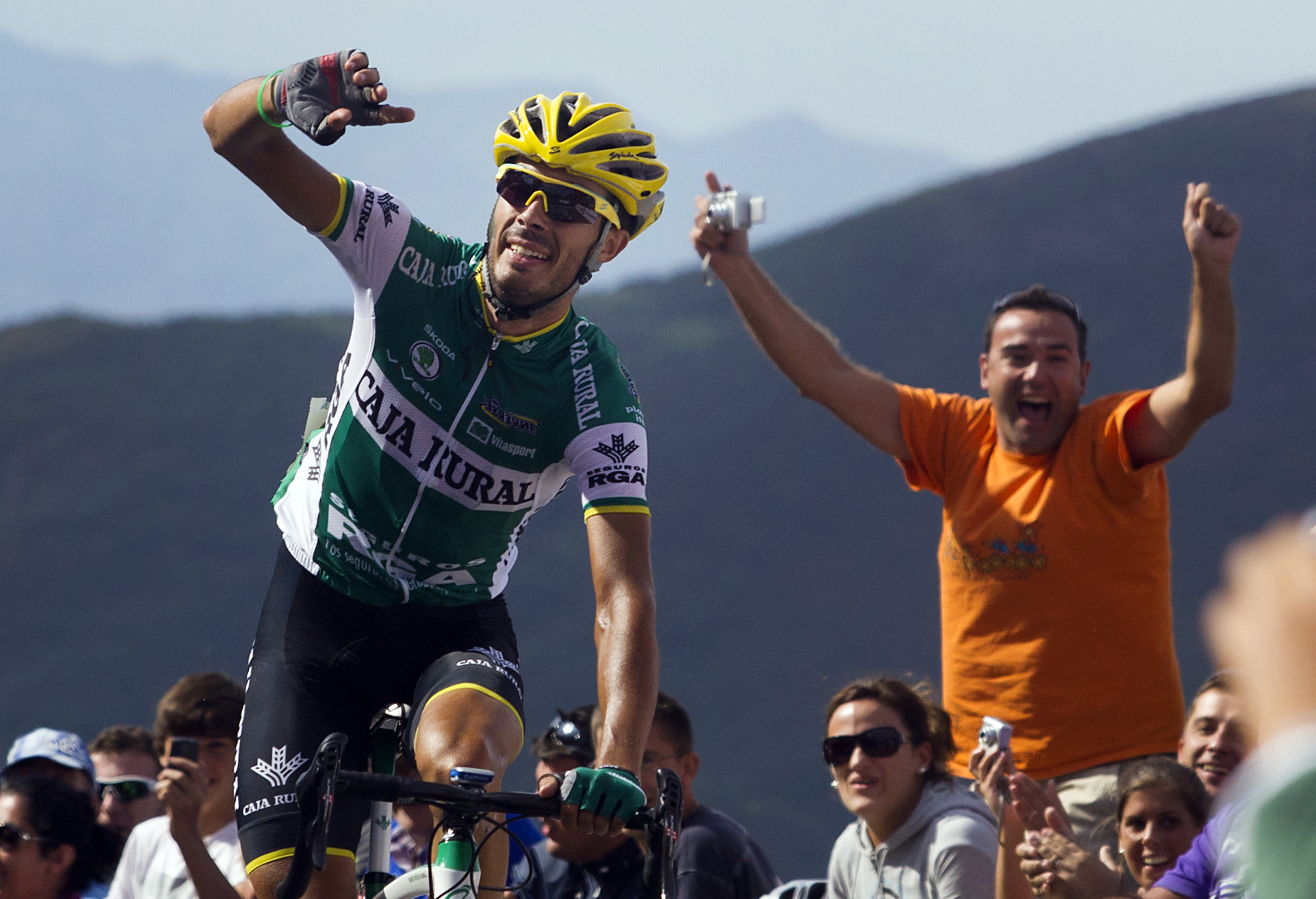 Spain&amp;amp;apos;s Antonio Piedra of Caja Rural celebrates on September 2, 2012 as he crosses the finish line to win the 15th stage of the Tour of Spain, a 186,5 kms ride from La Robla to Lagos de Covadonga. AFP PHOTO/ Jaime REINA (Photo credit should read JAIME REINA/AFP/GettyImages)