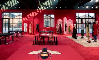 Interior of one Gucci room with red interior walls and flooring