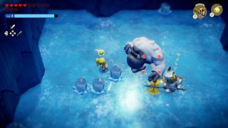 A The Legend of Zelda: Echoes of Wisdom screenshot showing Zelda and a Darknut warrior Echo fighting a boss in an icy arena