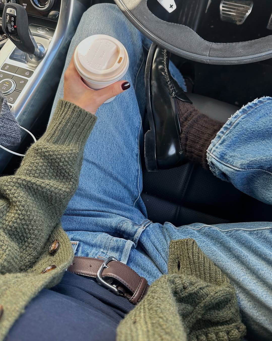 Woman wearing loafers with jeans outfit 2025.