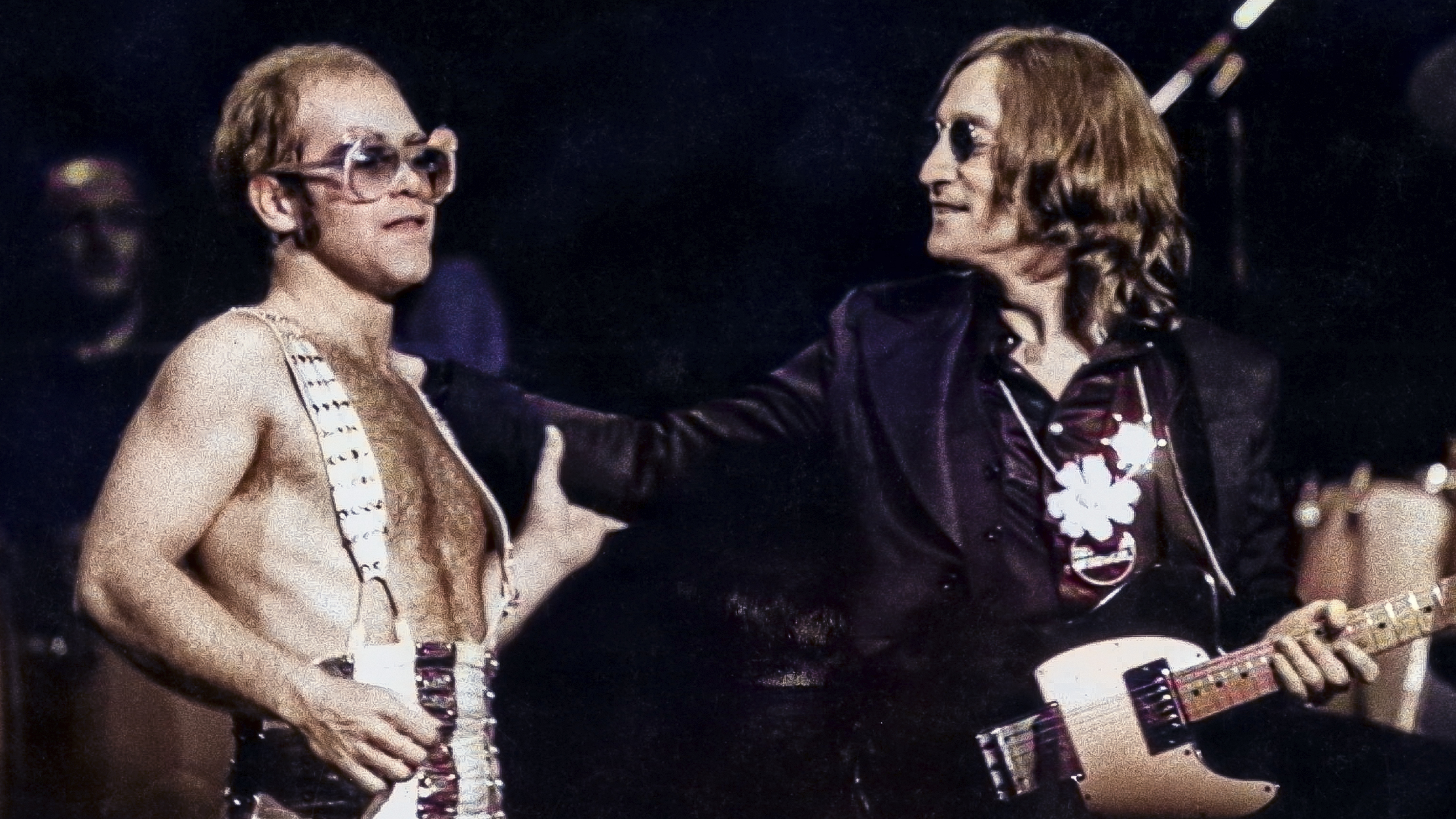 John Lennon (right) makes a surprise appearance at a concert by Elton John at Madison Square Garden, New York City, 28th November 1974.