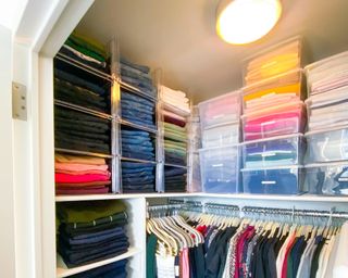 horderly organized wardrobe with labeled see through storage bins