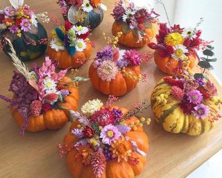 Mini pumpkins with dried flower decor