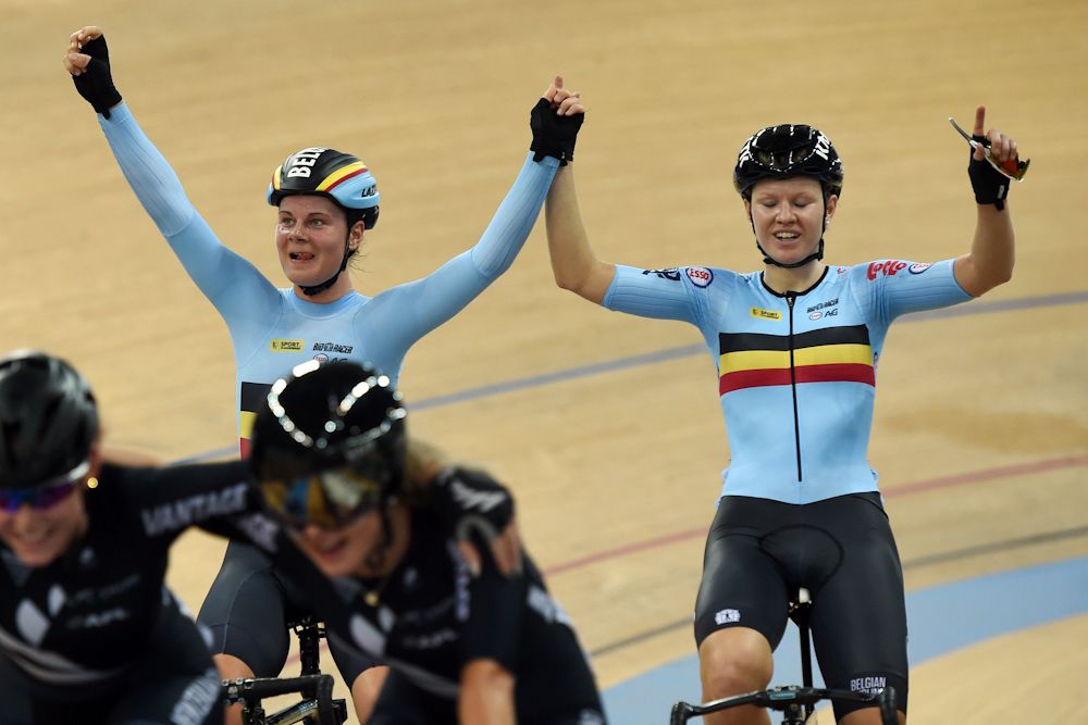 Belgium's Lotte Kopecky (R) celebrates with teammate Jolien D'hoore after winning the Women's Madison on day four of the 2017 Track Cycling World Championships