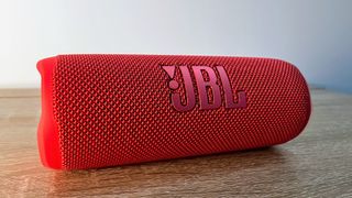 JBL Flip 6 in red on a table