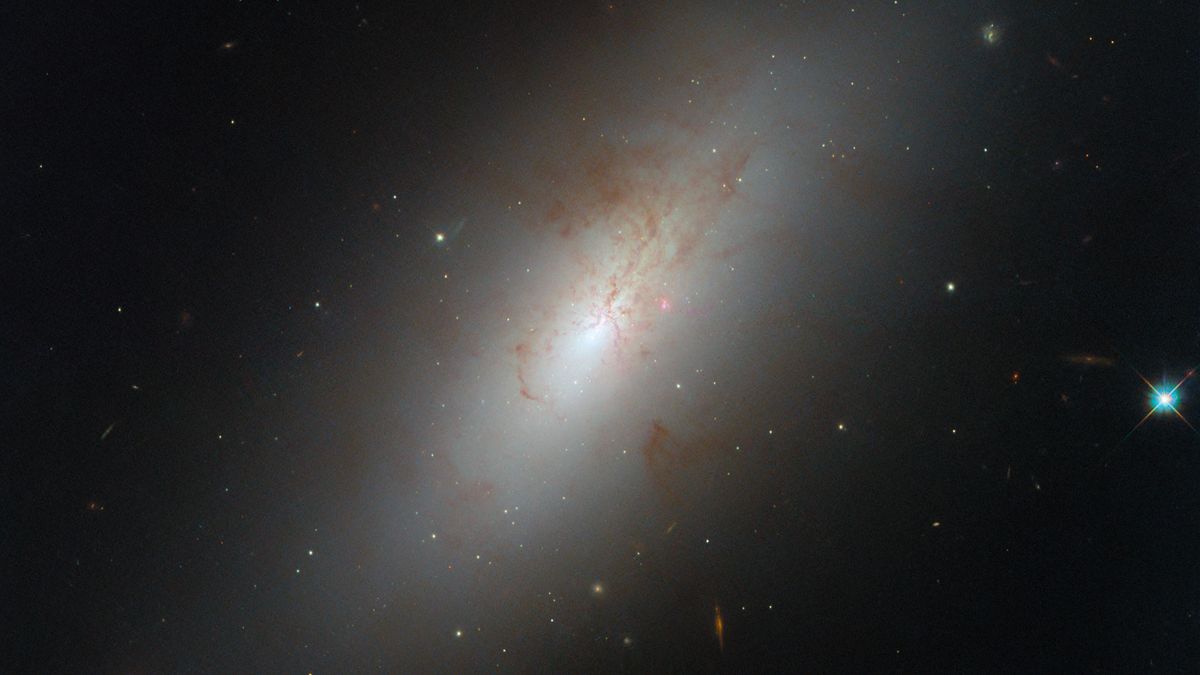 A lenticular galaxy called NGC 4694 captured by the Hubble Telescope 