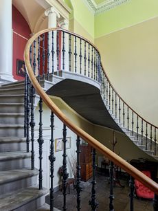 Fig 2: The 1820s staircase in the entrance hall at Wedderburn Castle, ©Paul Highnam for Country Life.