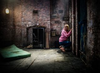 Terrified Kelly Neelan in a basement in Coronation Street