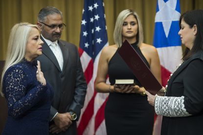 Wanda Vazquez is sworn in as Puerto Rico's new governor.