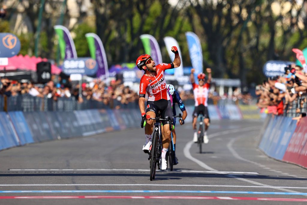 NAPOLI ITALY MAY 14 Thomas De Gendt of Belgium and Team Lotto Soudal celebrates winning ahead of Davide Gabburo of Italy and Team Bardiani CSF Faizane and Jorge Arcas Pea of Spain and Movistar Team during the 105th Giro dItalia 2022 Stage 8 a 153km stage from Napoli to Napoli Giro WorldTour on May 14 2022 in Napoli Italy Photo by Michael SteeleGetty Images