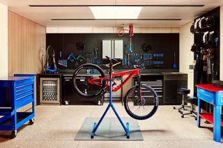 Bike shop at the Trail House by Gluckman Tang
