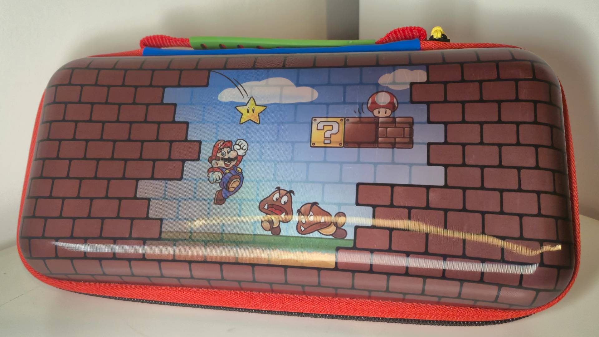 Photo of the Mario Bricks PlayTrek Switch 2 case sitting on a white desk.