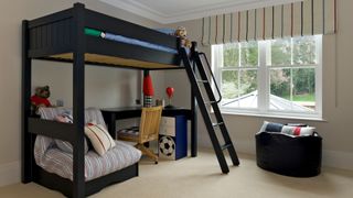 A bedroom with a loft bed