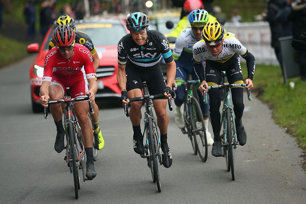 Roche rides in the breakaway before taking off with Voeckler in the finale