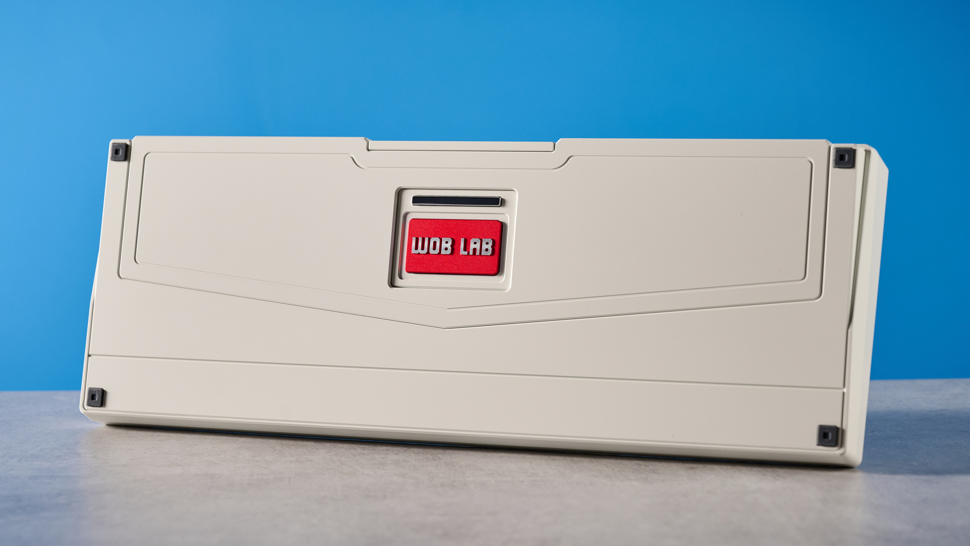 Wobkey Zen 65 mechanical keyboard photographed in front of a blue background