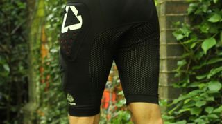 Photo from behind showing the mesh material off the Leatt Impact Shorts