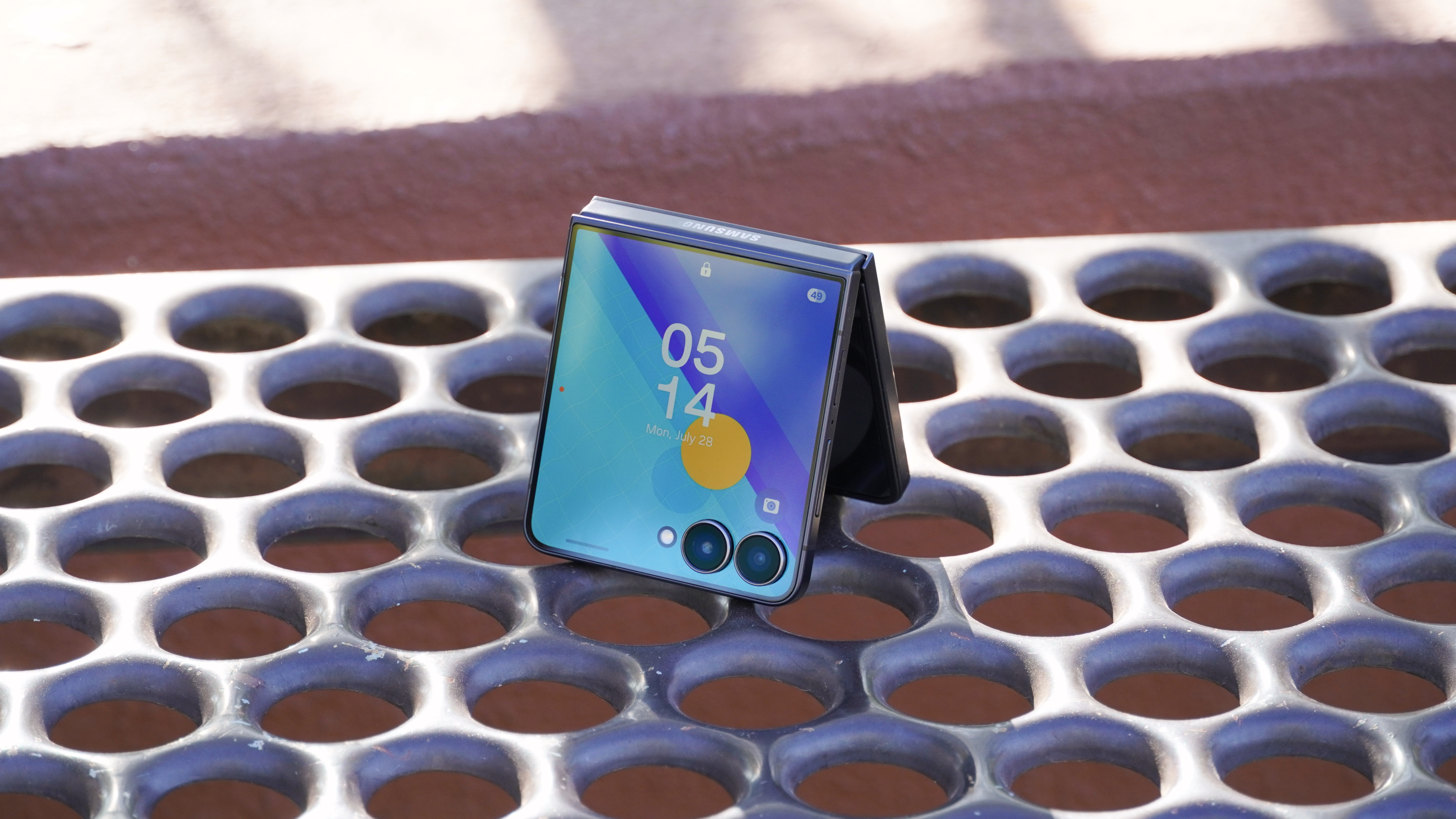 The Samsung Galaxy Z Flip 7 lock screen in tent mode.
