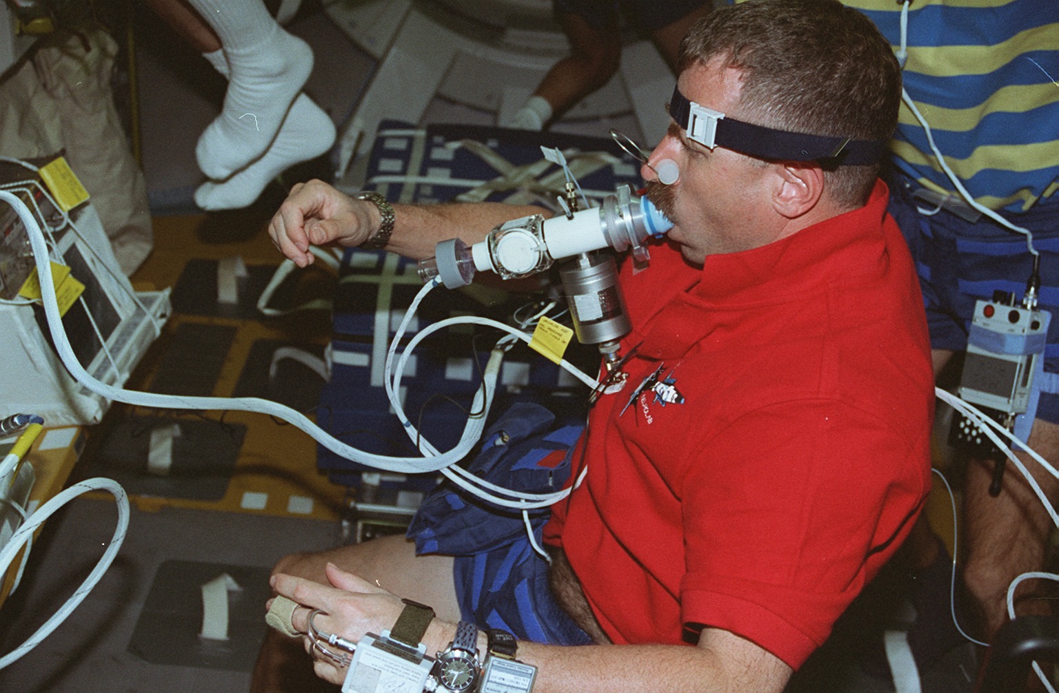 Canadian Space Agency astronaut David (Dave) Williams undergoes a lung function test during the STS-90 Neurolab mission in April/May 1998.