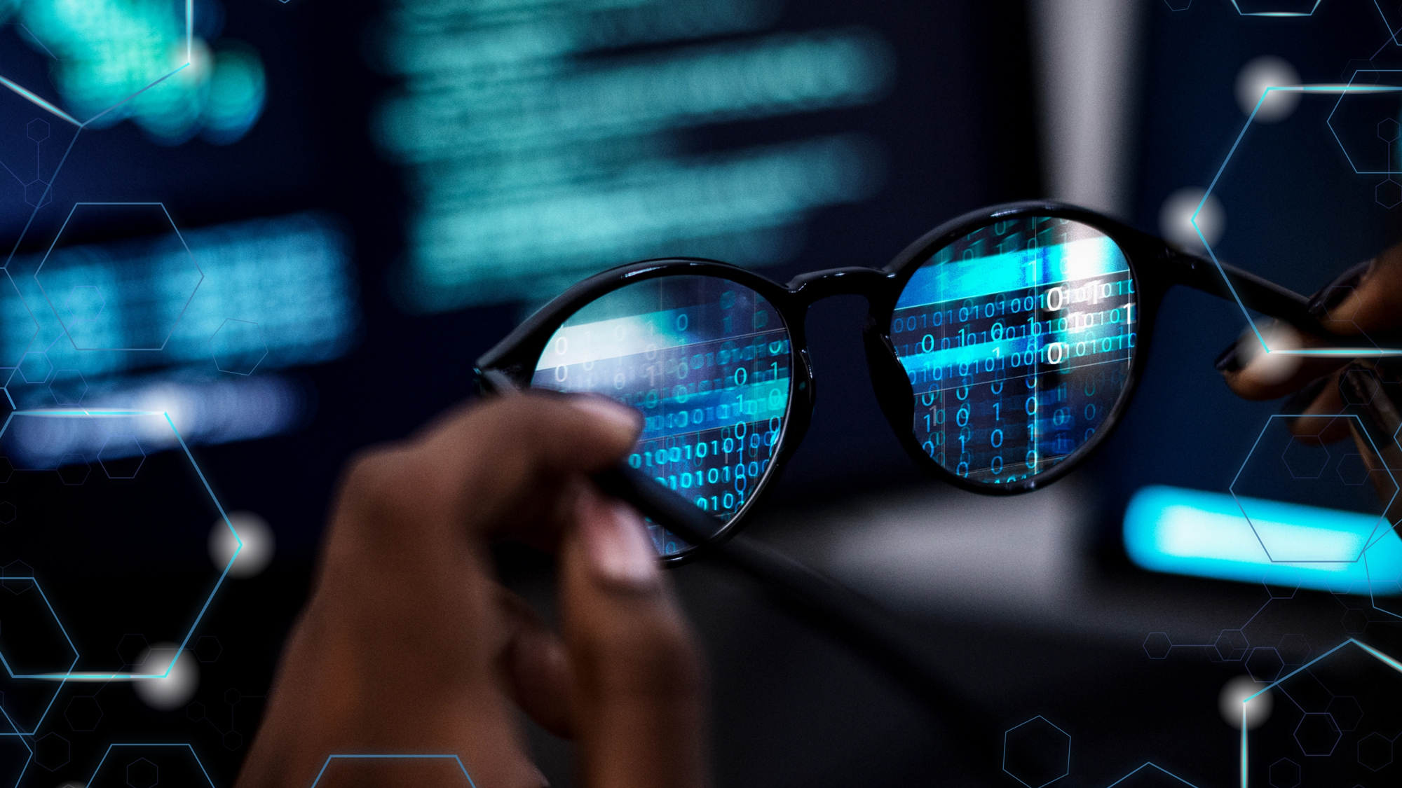 image of computer code in glasses