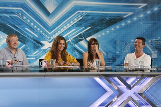 X Factor's Louis: 'Cheryl's hotter than Dannii'