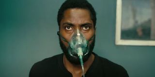 Tenet John David Washington wearing an oxygen mask