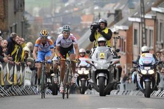 Philippe Gilbert (Omega Pharma - Lotto) leads David Millar and Bjorn Leukemans in their pursuit of Cancellara and Boonen.