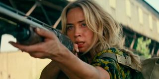 Emily Blunt anxiously holds a shotgun in A Quiet Place: Part II.