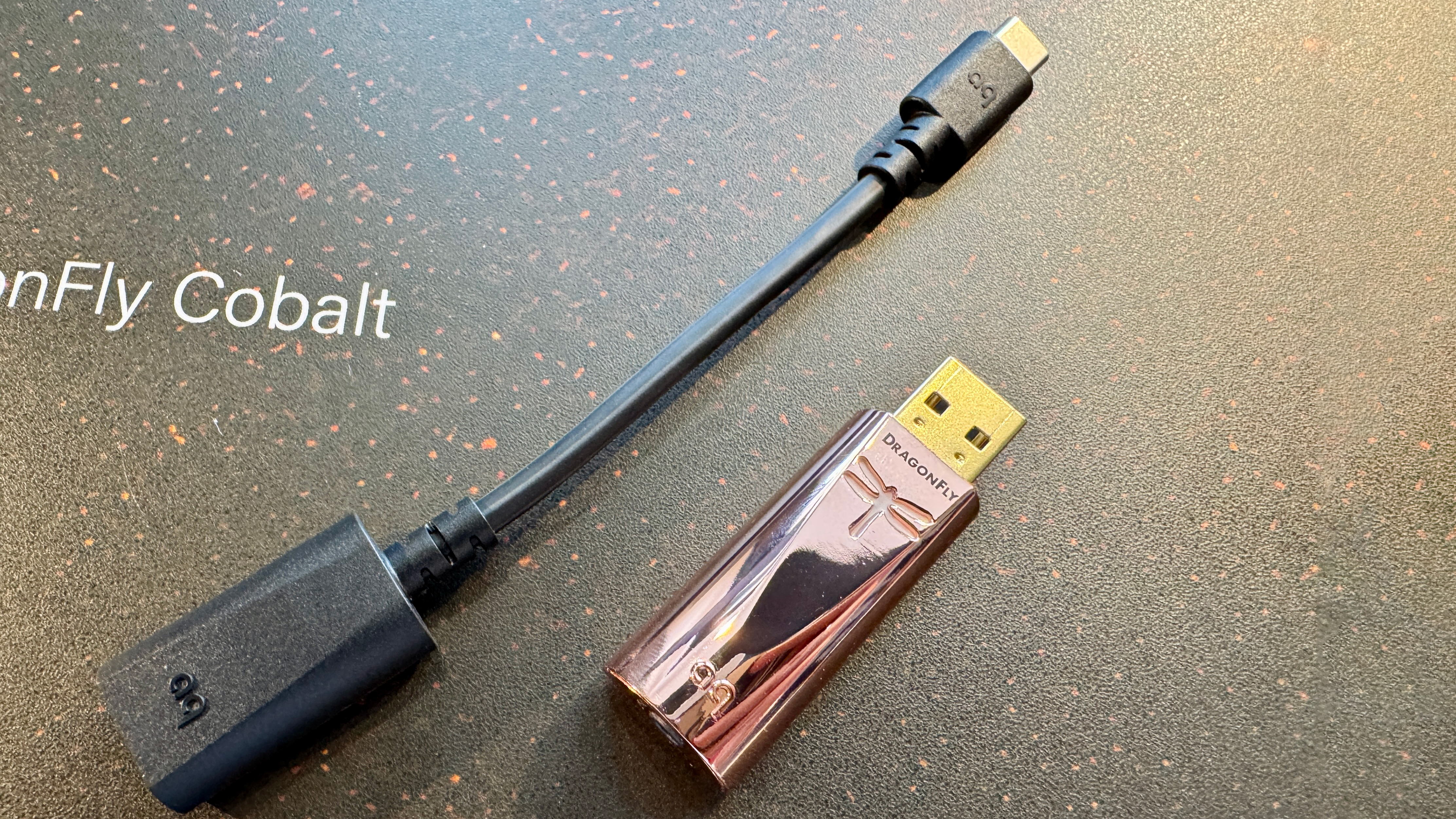 AudioQuest DragonFly Copper next to the USB-C adapter