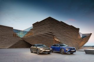 Two cars outside V&A Dundee building