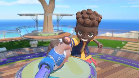 Two players engage in thumb wrestling in Nintendo Switch Sports Resort, with enlarged hands