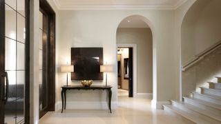 country estate hallway with black door frames