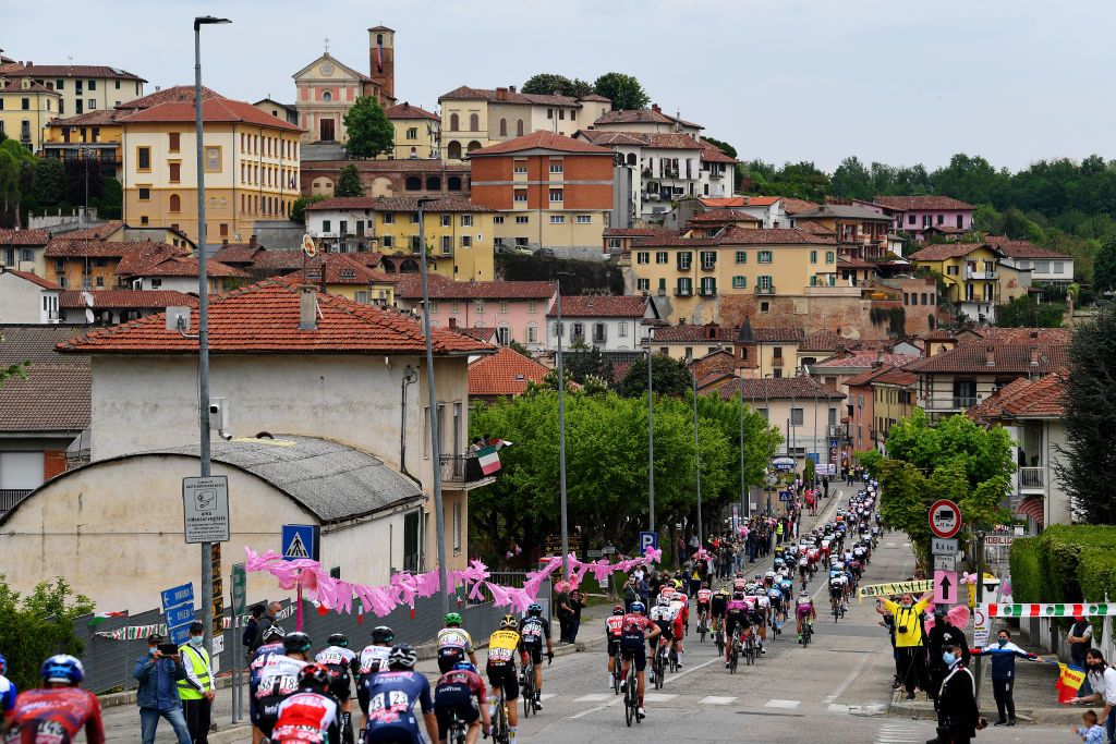NOVARA ITALY MAY 09 The peloton passing through Gallereto Village landscape during the 104th Giro dItalia 2021 Stage 2 a 179km stage from Stupinigi Nichelino to Novara Public Fans girodiitalia Giro UCIworldtour on May 09 2021 in Novara Italy Photo by Tim de WaeleGetty Images