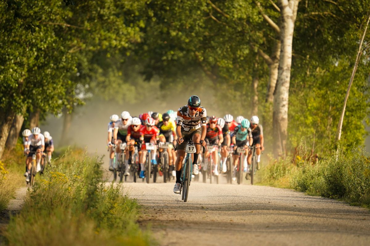 Thijs Koops is a second ahead of the peloton in 4th place at 16km.