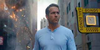 Ryan Reynolds walks around the city looking upset in Free Guy