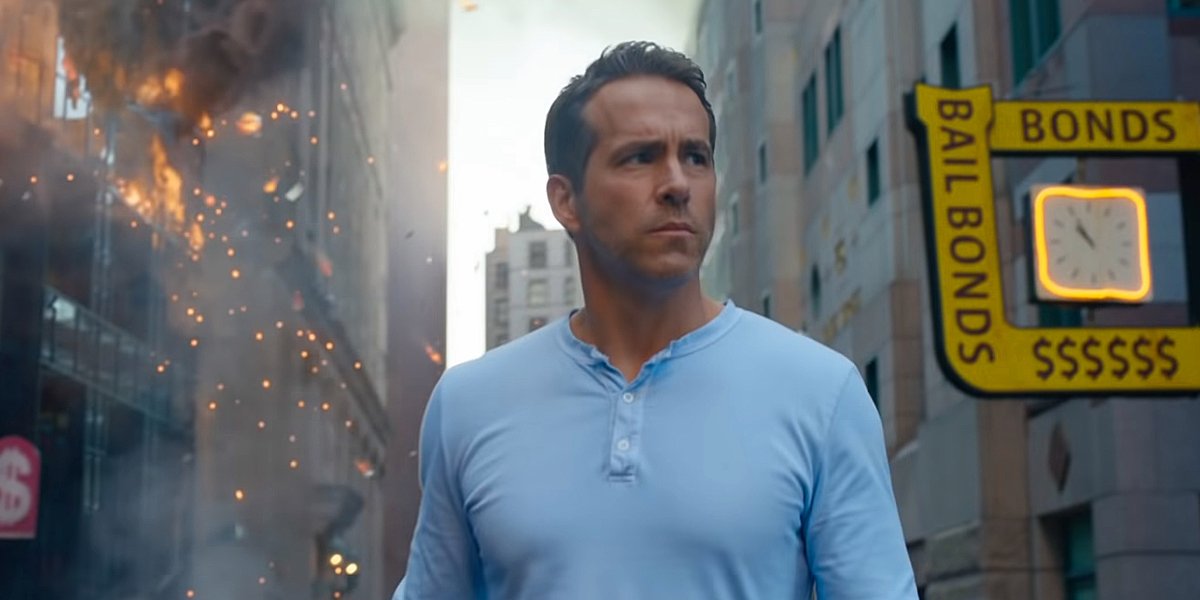 Ryan Reynolds walks around the city looking upset in Free Guy