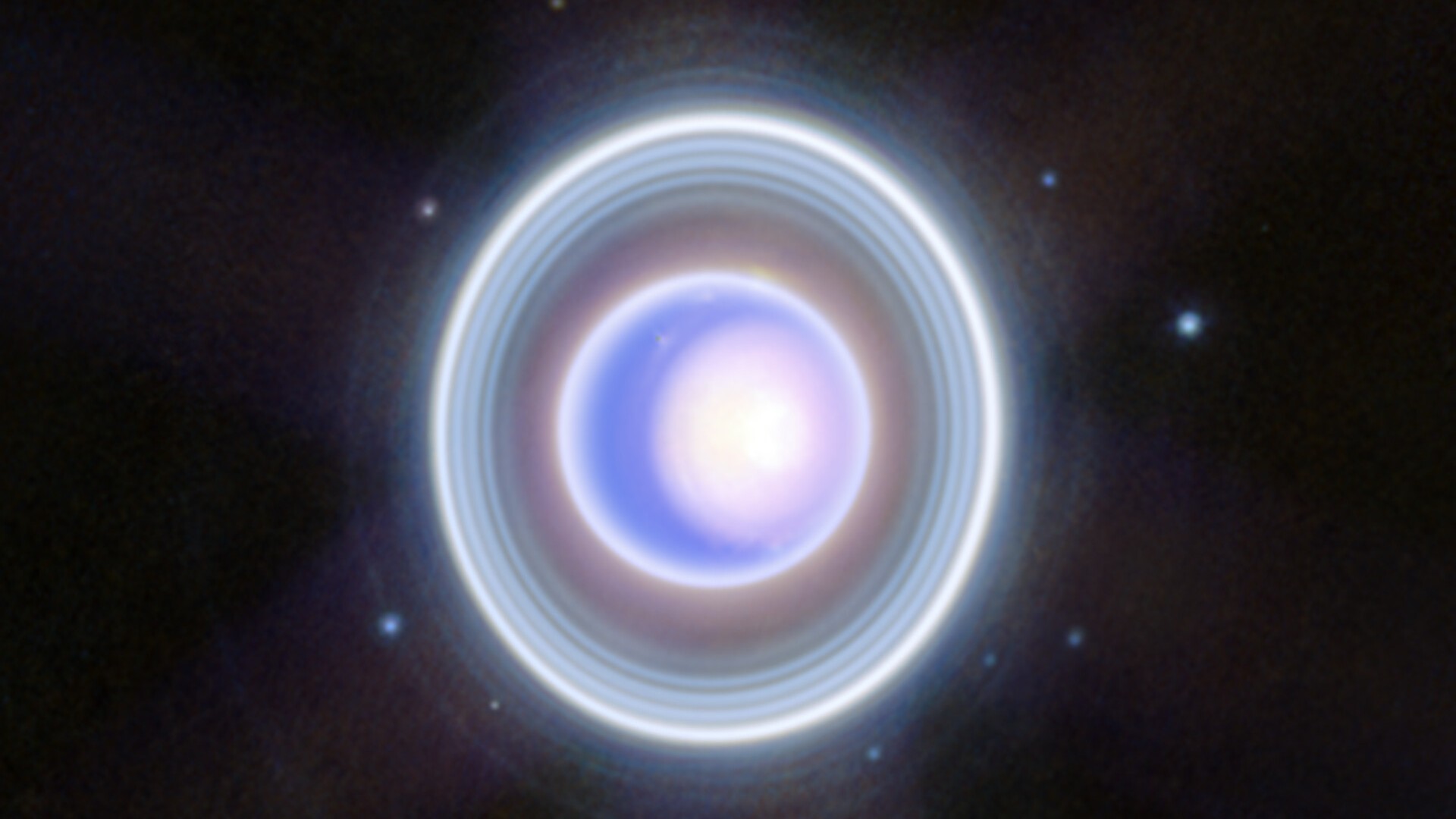 a bright orb surrounded by rings on a starry background