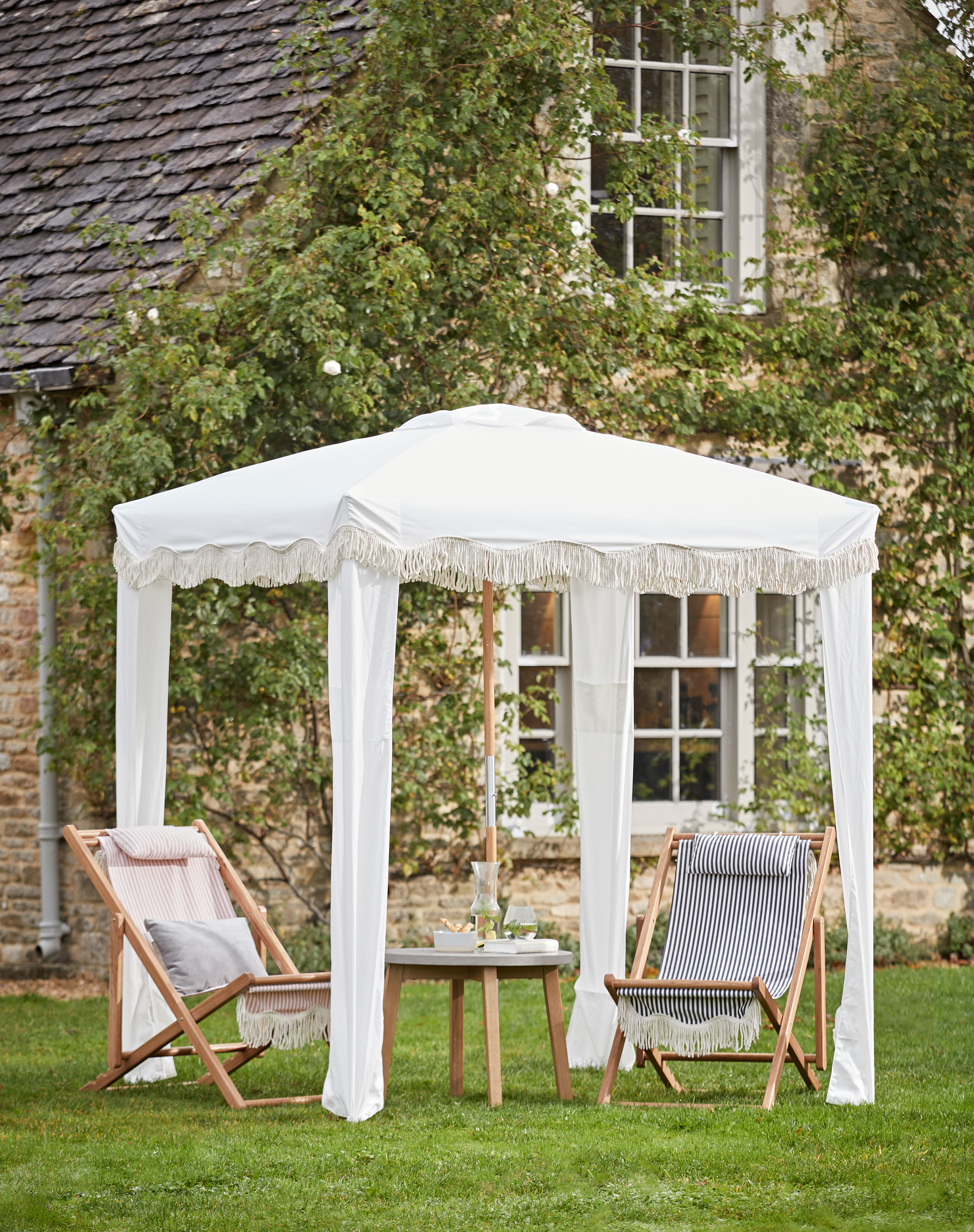 Garden trends: white canopies with seating Cox & Cox