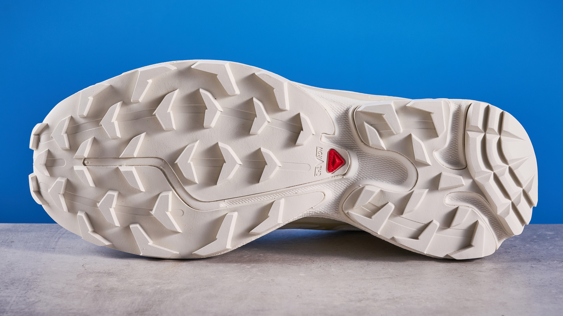 Salomon XT-6 in Vanilla Ice photographed in front of a blue background