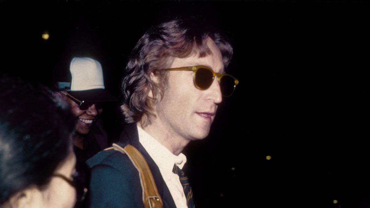 John Lennon and his wife Yoko Ono outside of the Times Square recording studio the Hit Factory before a recording session of his final album Double Fantasy, in New York City, August 1980