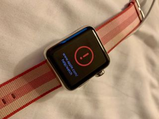 Apple Watch with red exclamation point