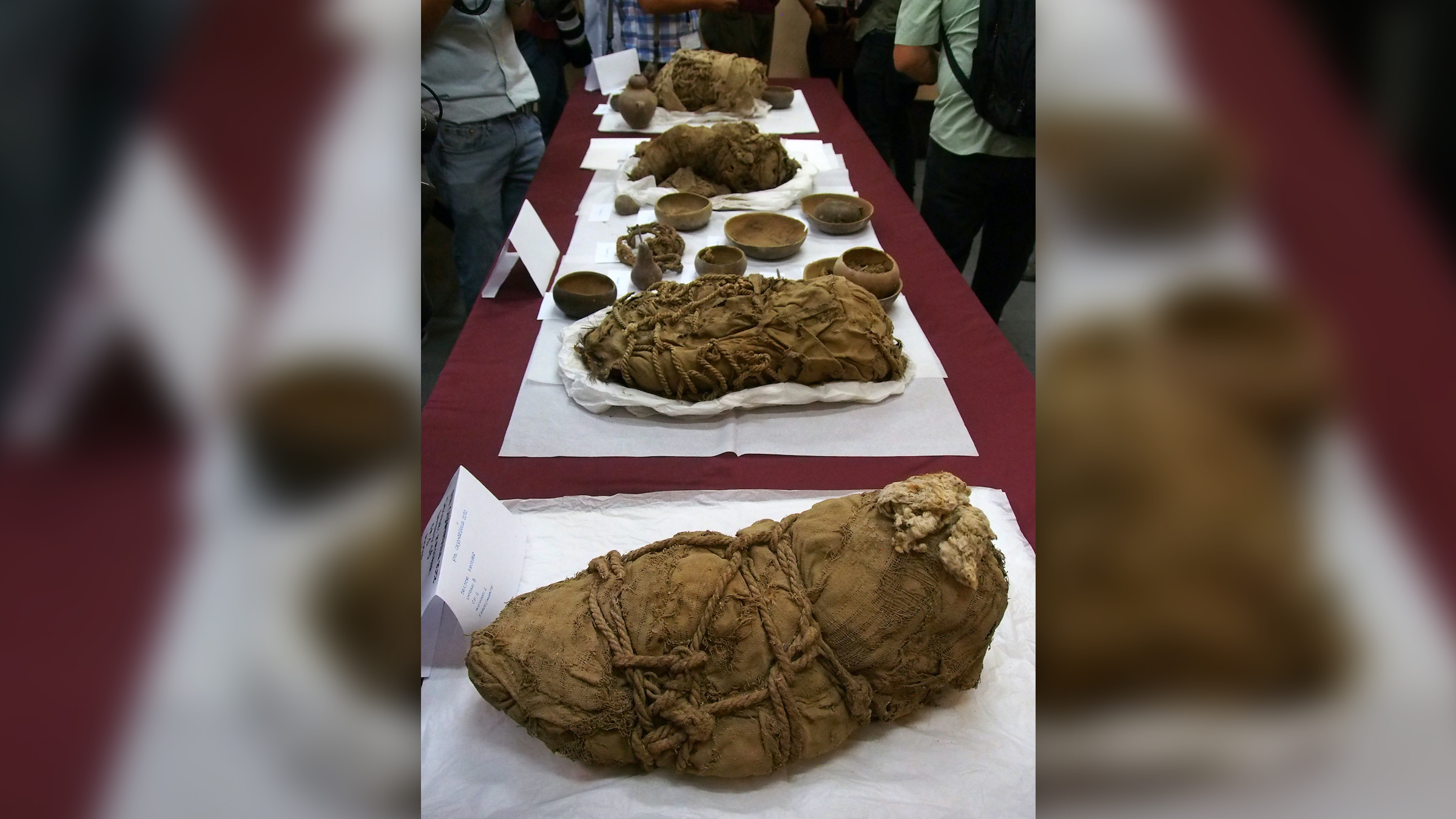 Artifacts and child mummies recovered from the Cajamarquilla Archaeological Complex in Peru.